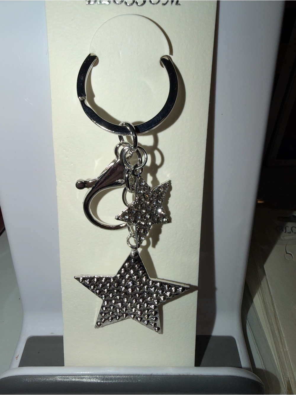 silver tone metal star keychain